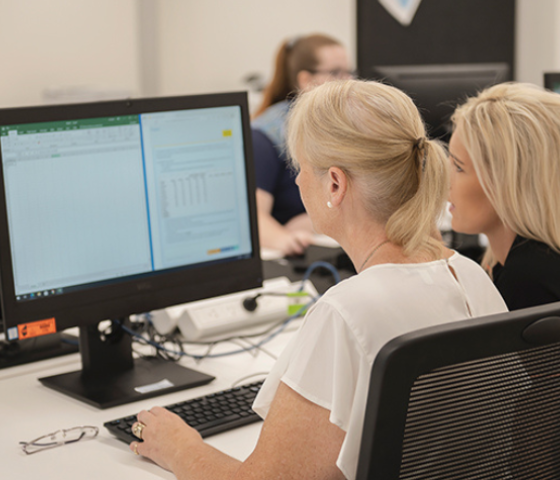 students working at a computer