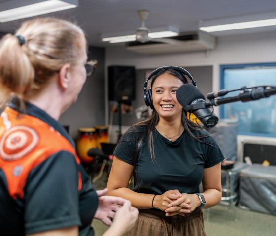 Student singing into microphone