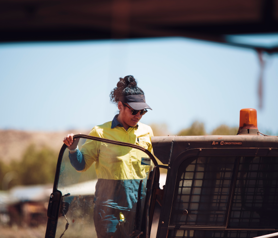 Student entering skid steer